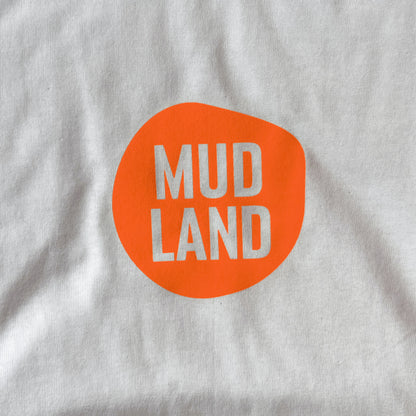 Mudland T-shirt - orange logo on white tee